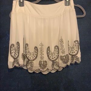 White, beaded skirt